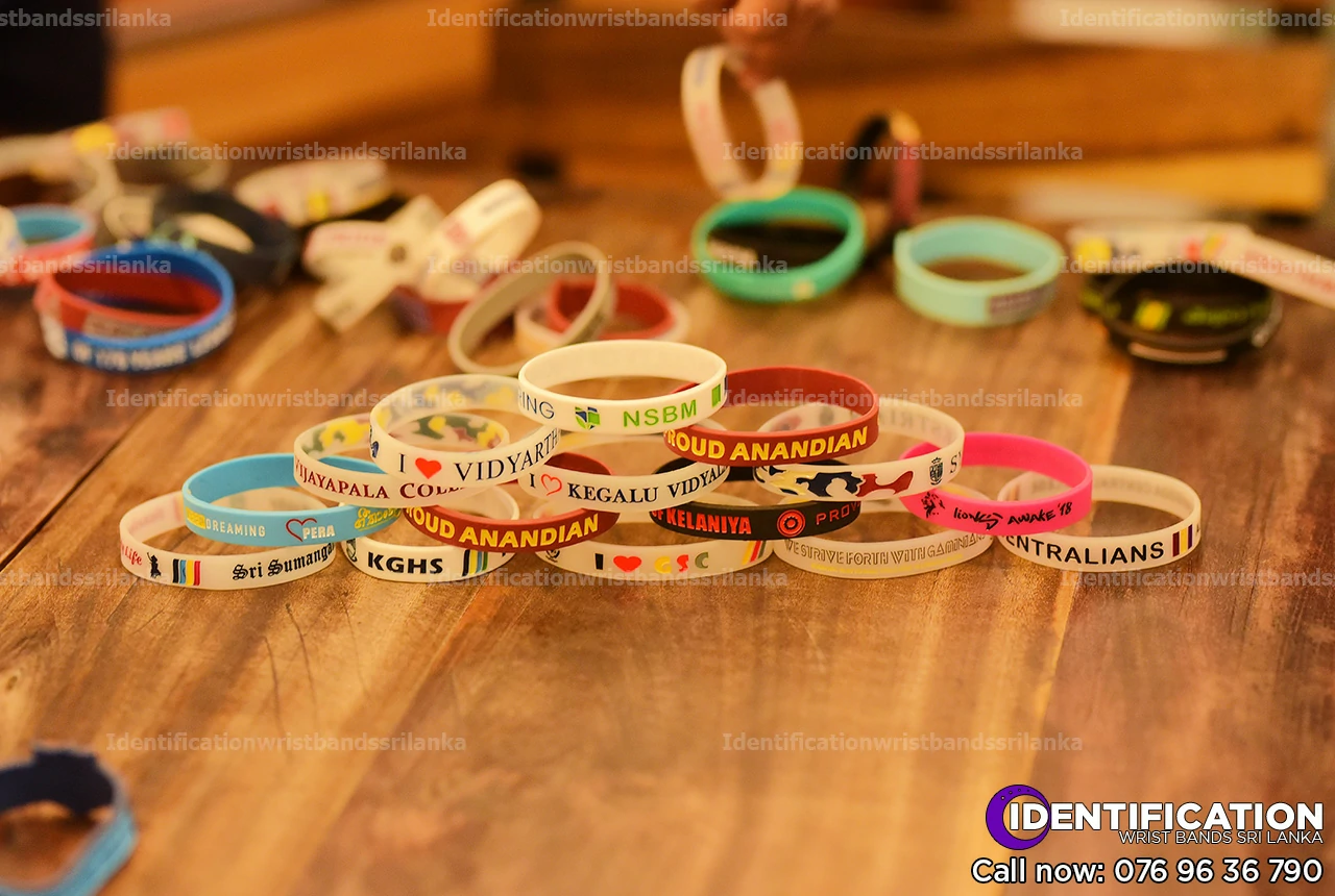 Debossed silicone identification wristbands, design for school big match events in Sri Lanka