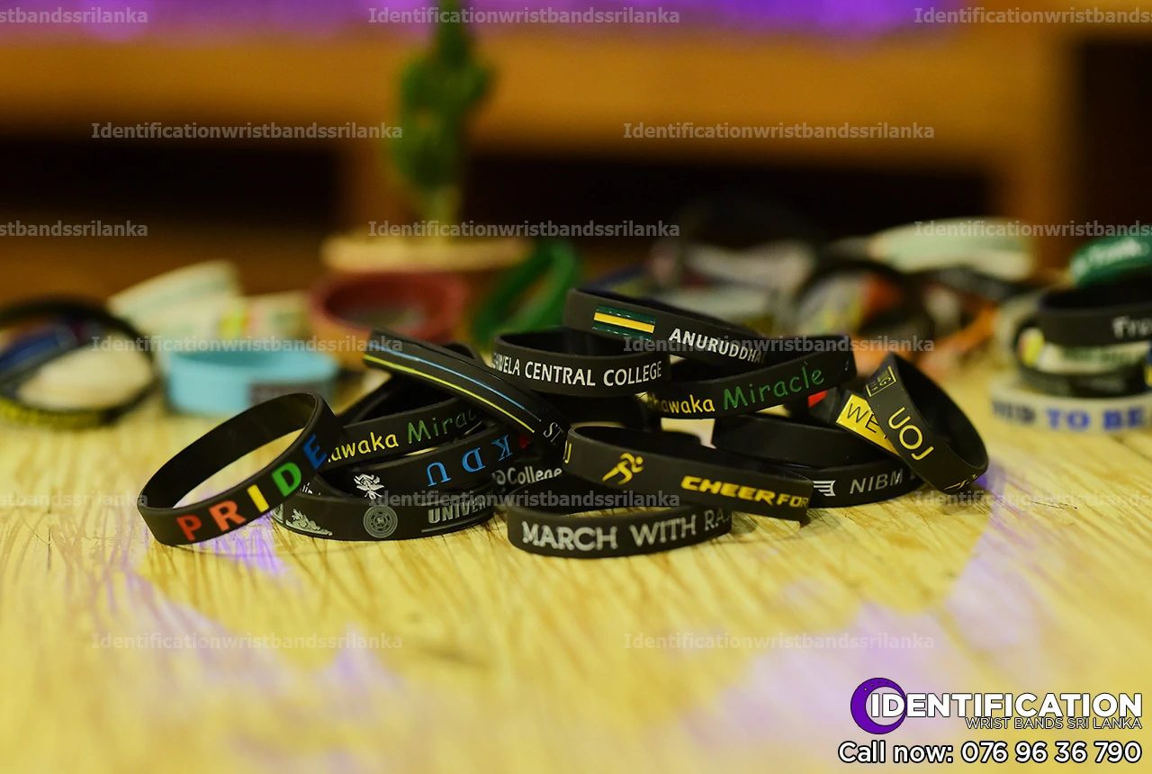 Debossed black silicone identification wristbands, design for school fundraising events in Sri Lanka